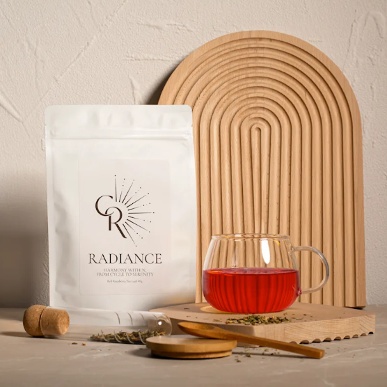 Eco-friendly packaging of Radiance Loose Leaf Tea showing beauty-boosting ingredients- supports monthly cycle 
